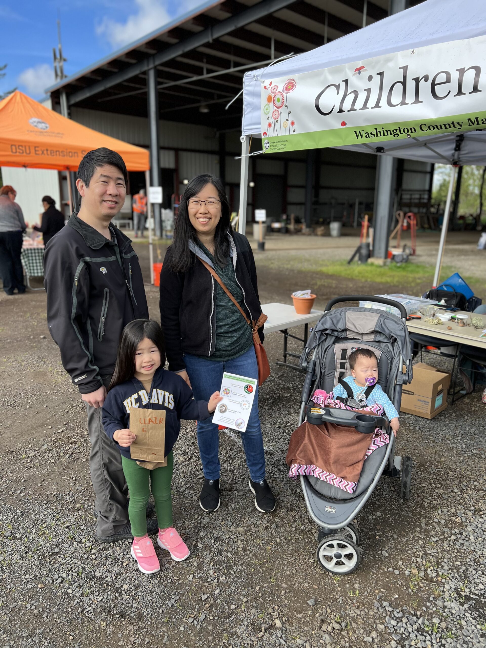 Image of family of four at Gardenfest 2023 Children's booth